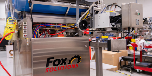 Fox Solutions automated bagging equipment on a produce packaging line